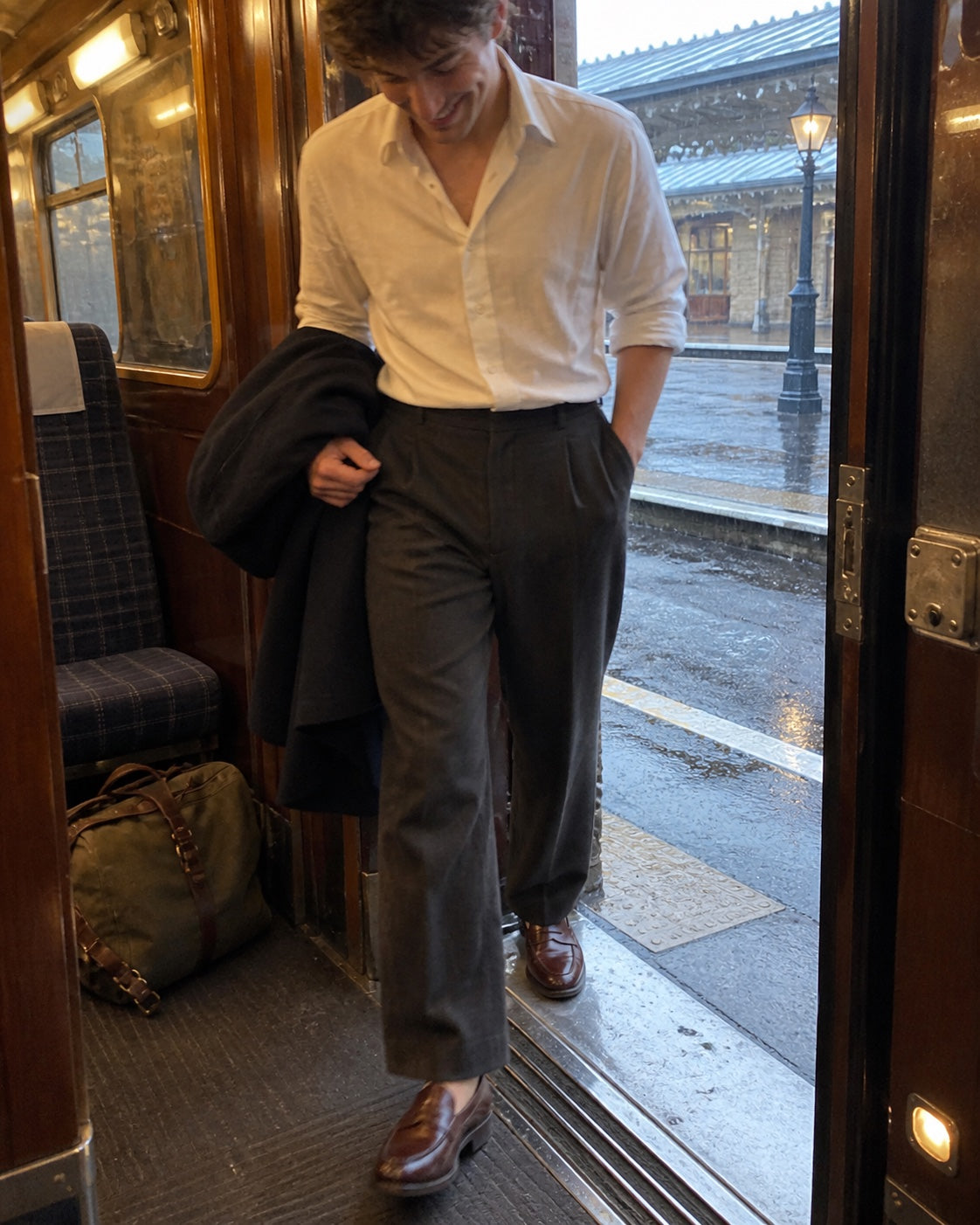 Customer wearing loafers on a rainy train platform